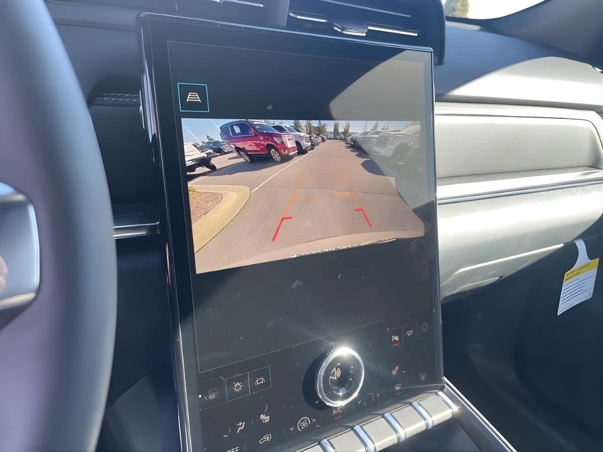GMC rear vision camera display showing parking assistance and safety guidelines at Crain Buick GMC of Conway